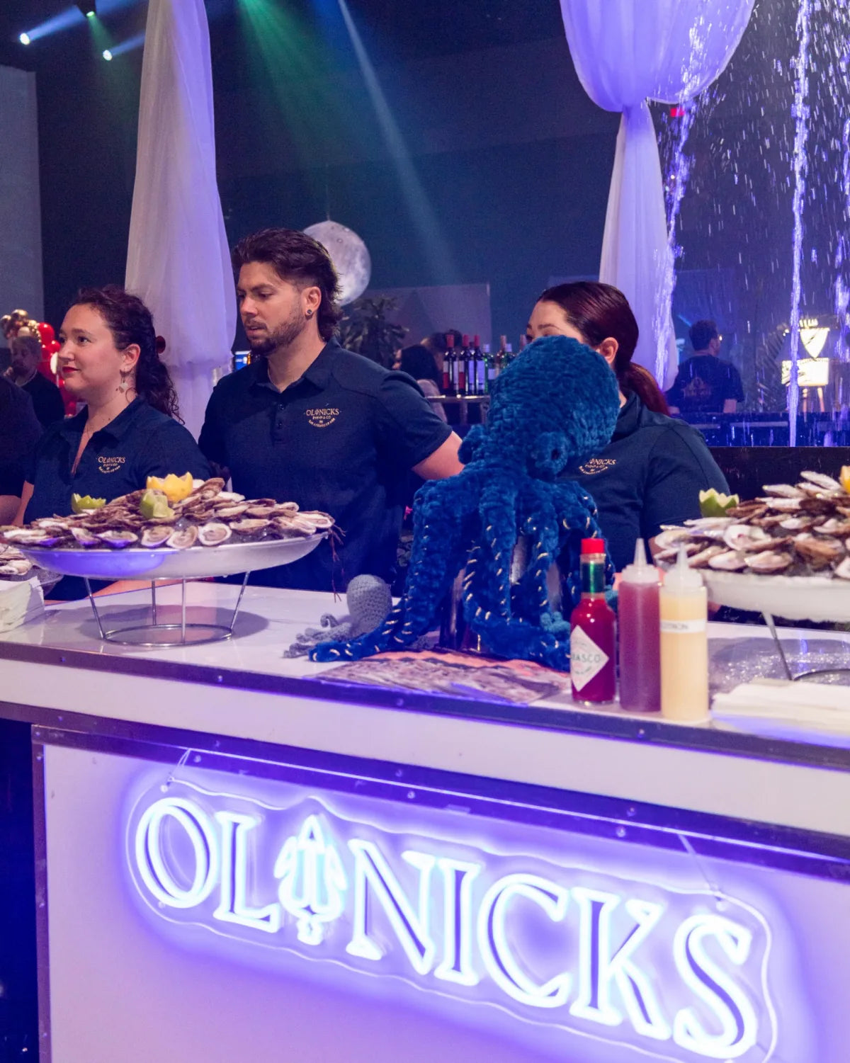White Ol' Nicks custom LED neon sign on a catered corporate event bar